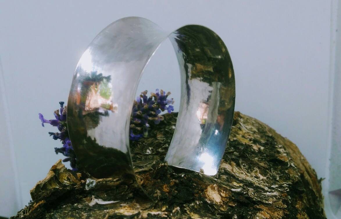 Silver anticlastic cuff bangle